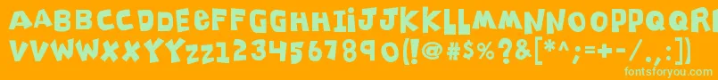 K26clippitysnippity Font – Green Fonts on Orange Background