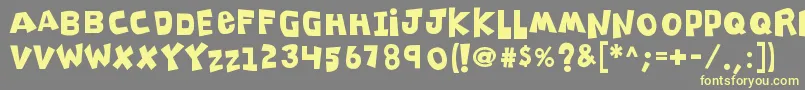 K26clippitysnippity Font – Yellow Fonts on Gray Background