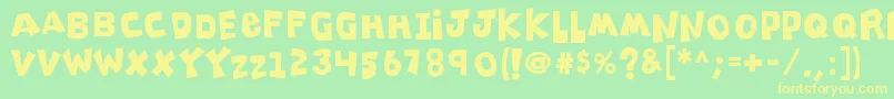 K26clippitysnippity Font – Yellow Fonts on Green Background