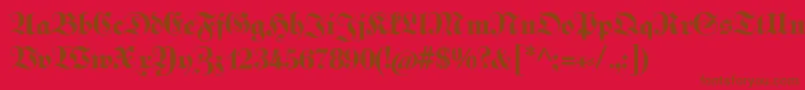 Fettekabinettfraktur Font – Brown Fonts on Red Background