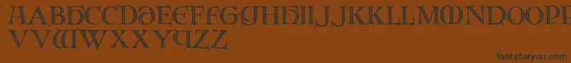 フォントBrandegoris – 黒い文字が茶色の背景にあります