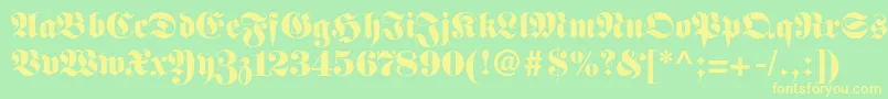 Fettefrakturltstd Font – Yellow Fonts on Green Background