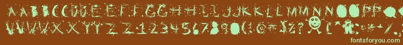 フォントStaticClingStatic – 緑色の文字が茶色の背景にあります。