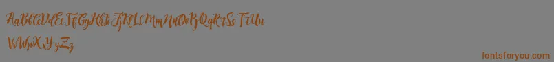 DirtylineRisingBrushFree-Schriftart – Braune Schriften auf grauem Hintergrund