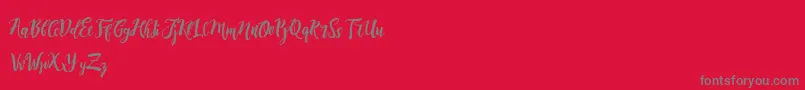 Fonte DirtylineRisingBrushFree – fontes cinzas em um fundo vermelho