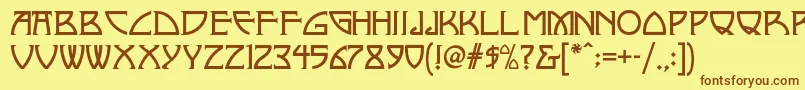 フォントNickleynf – 茶色の文字が黄色の背景にあります。