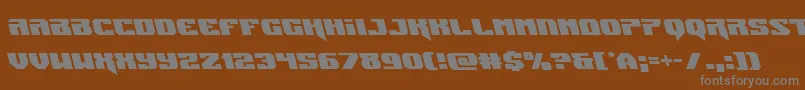 フォントJumpersleft – 茶色の背景に灰色の文字