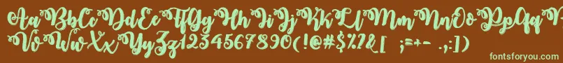 フォントMidnightInOctoberOtf – 緑色の文字が茶色の背景にあります。