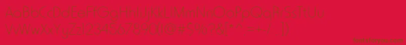 Fonte Horatiodlig – fontes marrons em um fundo vermelho