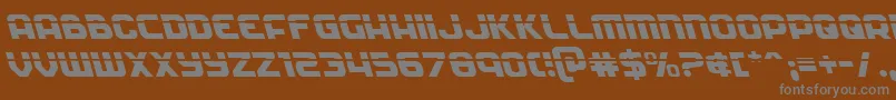 Soldierlaserleft-fontti – harmaat kirjasimet ruskealla taustalla