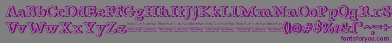 Шрифт BonebasticOutlineDemo – фиолетовые шрифты на сером фоне