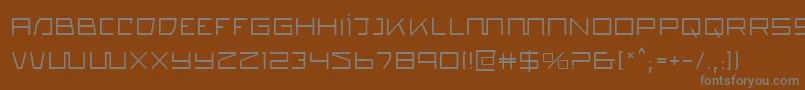 フォントQuasitron – 茶色の背景に灰色の文字