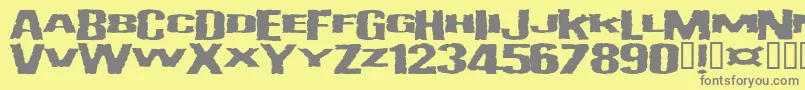 フォントVulgar – 黄色の背景に灰色の文字