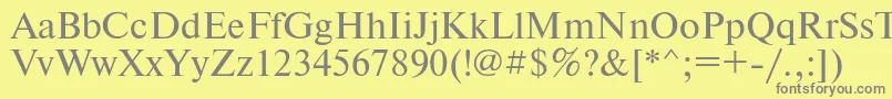 フォントTimeset – 黄色の背景に灰色の文字