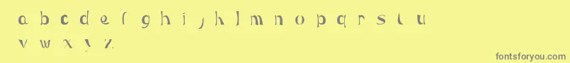 フォントMaera – 黄色の背景に灰色の文字