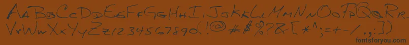 fuente MkumbaRegular – Fuentes Negras Sobre Fondo Marrón