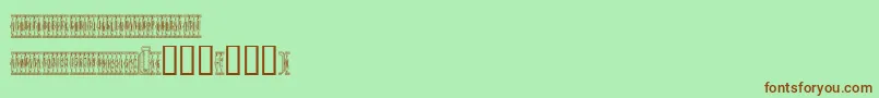 フォントSardinescanned – 緑の背景に茶色のフォント