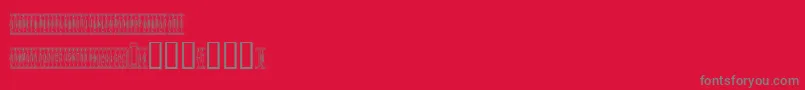Sardinescanned-fontti – harmaat kirjasimet punaisella taustalla