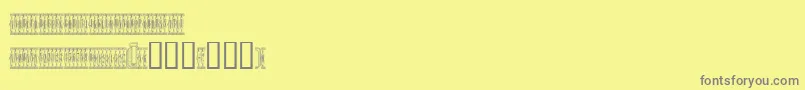 Sardinescanned-Schriftart – Graue Schriften auf gelbem Hintergrund