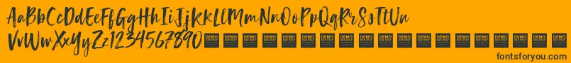LuckyTurnsDemo-Schriftart – Schwarze Schriften auf orangefarbenem Hintergrund