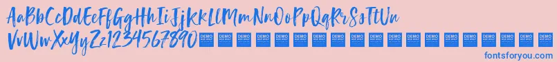 LuckyTurnsDemo-Schriftart – Blaue Schriften auf rosa Hintergrund