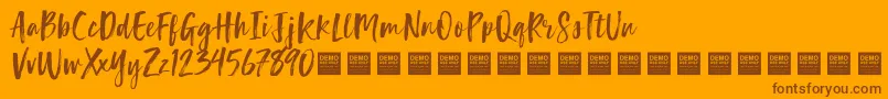 フォントLuckyTurnsDemo – オレンジの背景に茶色のフォント