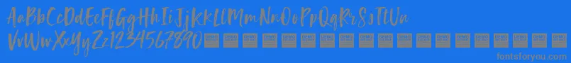 LuckyTurnsDemo-Schriftart – Graue Schriften auf blauem Hintergrund