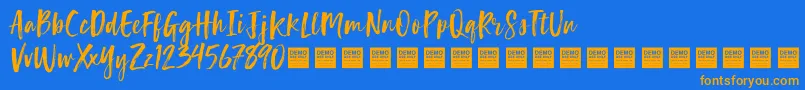 フォントLuckyTurnsDemo – オレンジ色の文字が青い背景にあります。