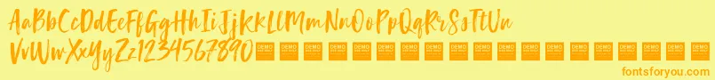 フォントLuckyTurnsDemo – オレンジの文字が黄色の背景にあります。