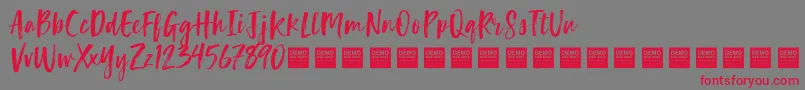Police LuckyTurnsDemo – polices rouges sur fond gris