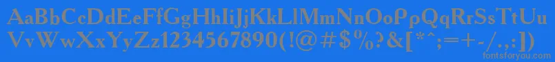 AcademiaBold-fontti – harmaat kirjasimet sinisellä taustalla