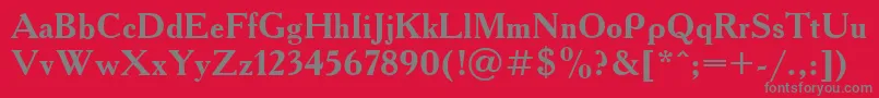 AcademiaBold-fontti – harmaat kirjasimet punaisella taustalla