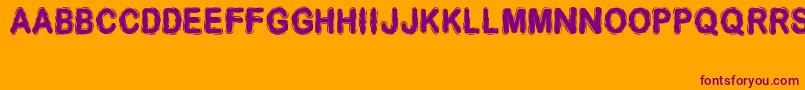 Desminore Font – Purple Fonts on Orange Background