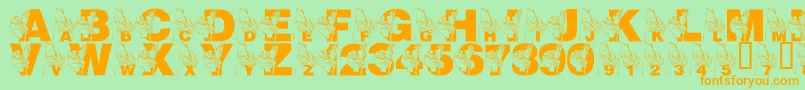 LmsMrJeremyFisher-Schriftart – Orangefarbene Schriften auf grünem Hintergrund