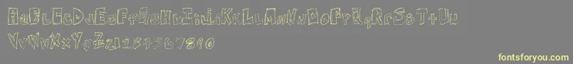 FreeNightsAndWeekends-Schriftart – Gelbe Schriften auf grauem Hintergrund