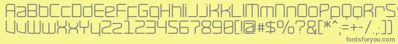 RavepartyPoster-fontti – harmaat kirjasimet keltaisella taustalla