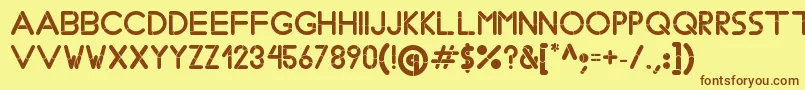 フォントBobzType – 茶色の文字が黄色の背景にあります。