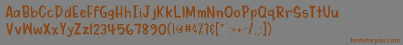 フォントMydearwatsonRegular – 茶色の文字が灰色の背景にあります。