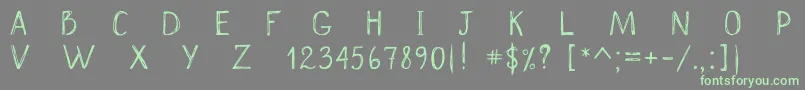 Scrawnynorah Font – Green Fonts on Gray Background