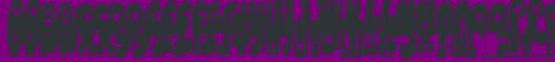 Czcionka ChunkyCheese – czarne czcionki na fioletowym tle