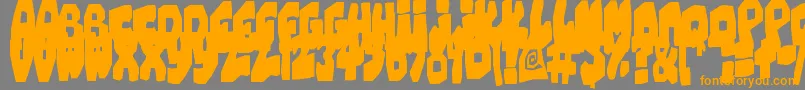 フォントChunkyCheese – オレンジの文字は灰色の背景にあります。