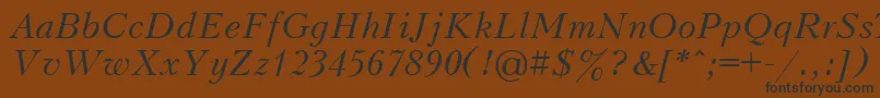 フォントKudri2 – 黒い文字が茶色の背景にあります