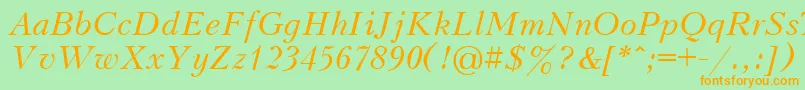 フォントKudri2 – オレンジの文字が緑の背景にあります。