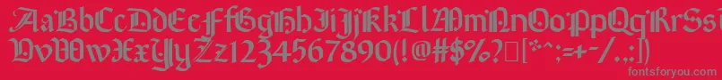 フォントBrinkmann – 赤い背景に灰色の文字