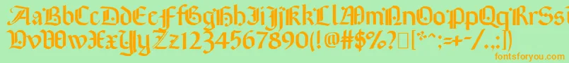 Brinkmann-Schriftart – Orangefarbene Schriften auf grünem Hintergrund