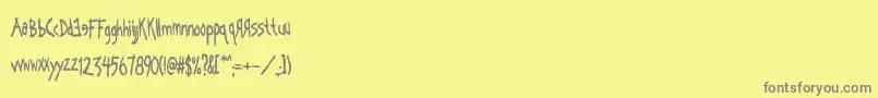 Kornography Font – Gray Fonts on Yellow Background