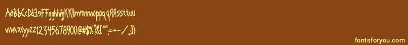 Kornography Font – Yellow Fonts on Brown Background