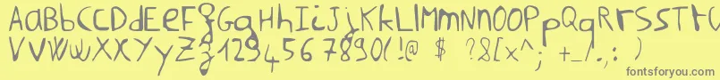 NilmsaHard Font – Gray Fonts on Yellow Background