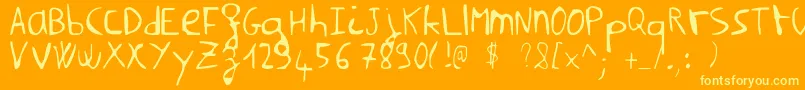 NilmsaHard Font – Yellow Fonts on Orange Background