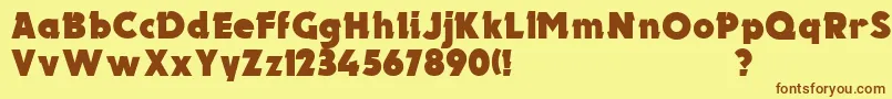 フォントUkElectron – 茶色の文字が黄色の背景にあります。